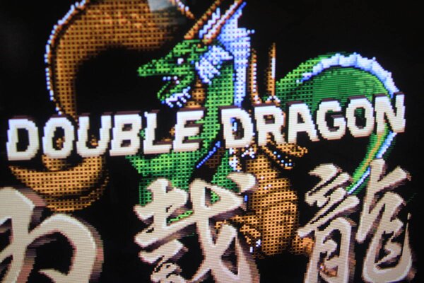 Fallo del sprite de la pantalla principal de una placa arcade Double Dragon de Technos
